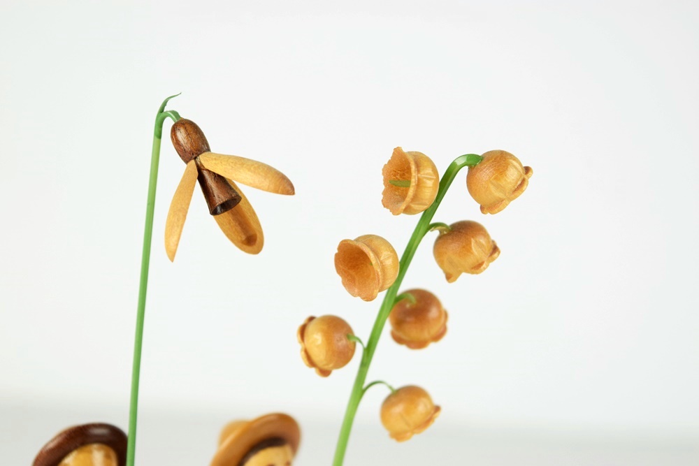 Five Hand Carved German Miniature Figures Holding Flowers