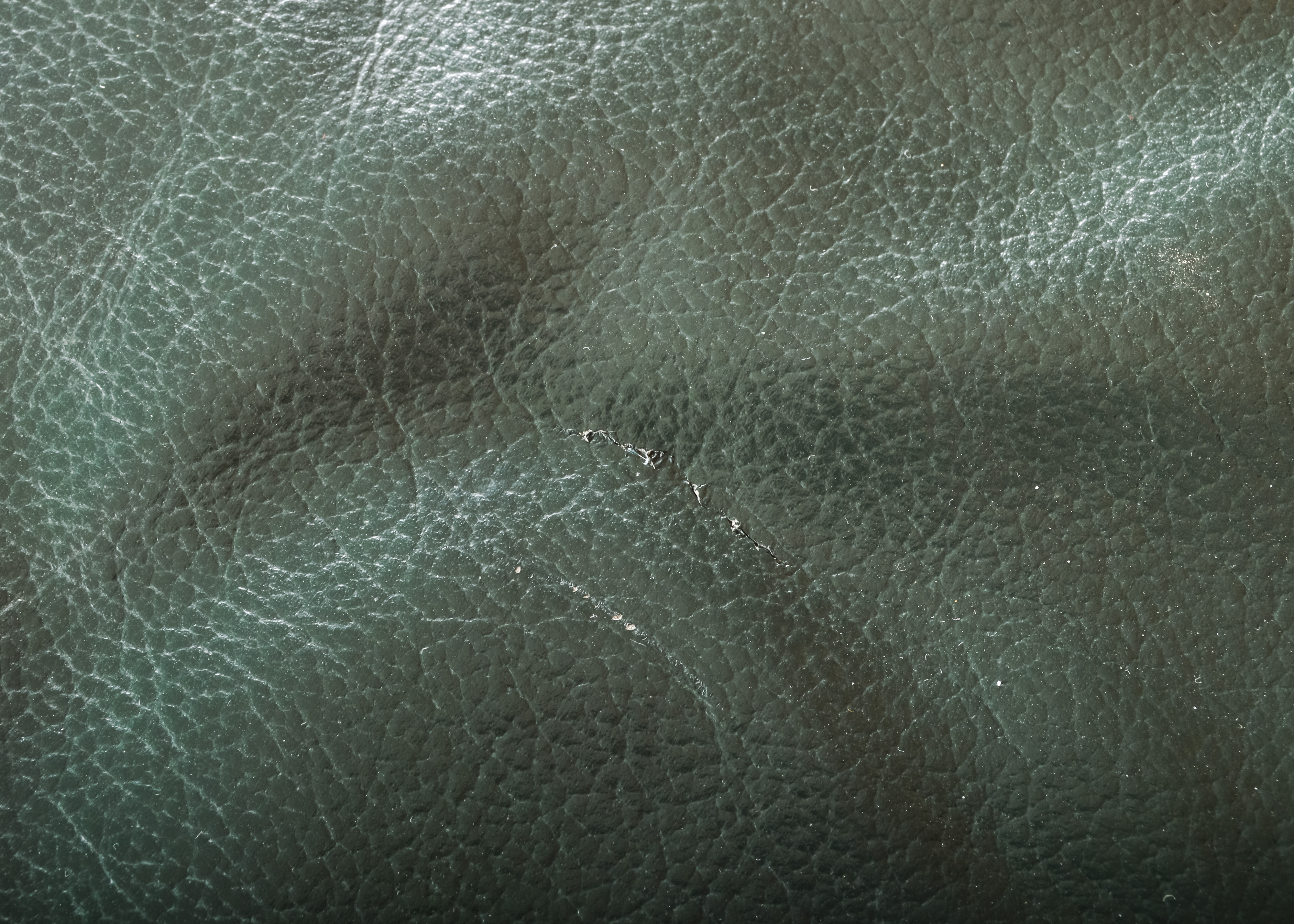 Green Leather Ottoman