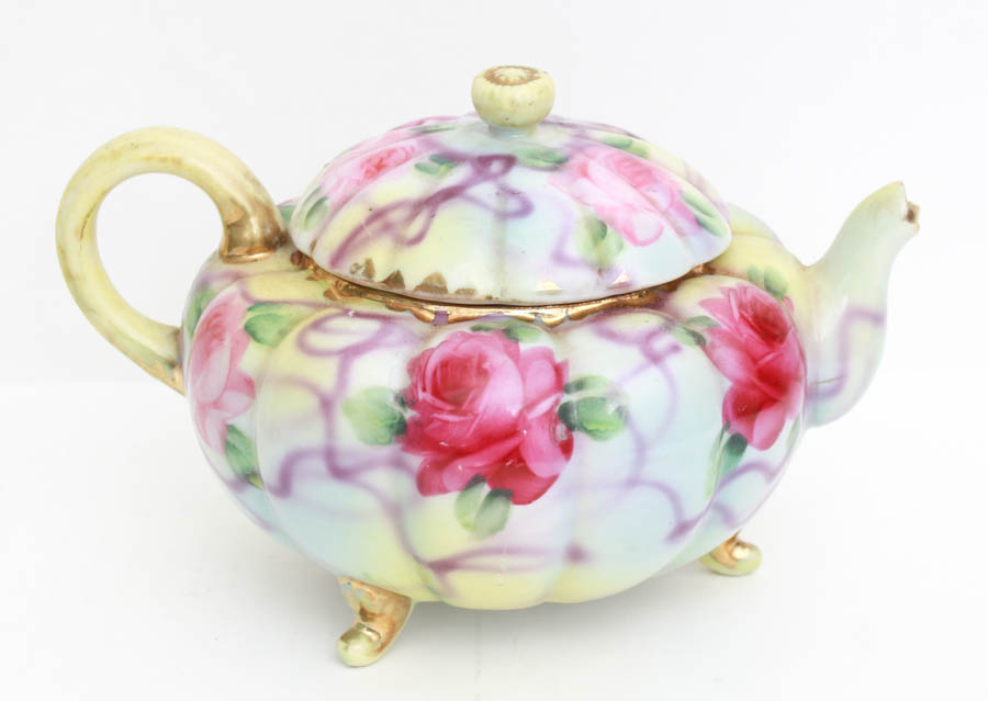 Teapot and Decorative Plant