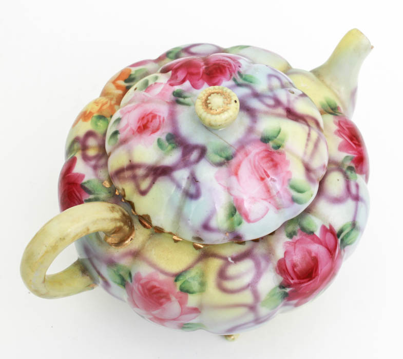 Teapot and Decorative Plant