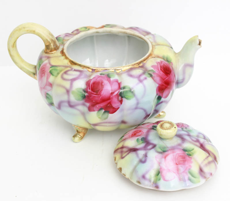 Teapot and Decorative Plant