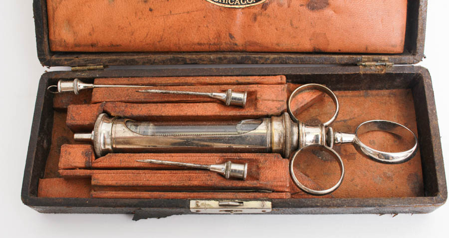Antique Syringe and Razor