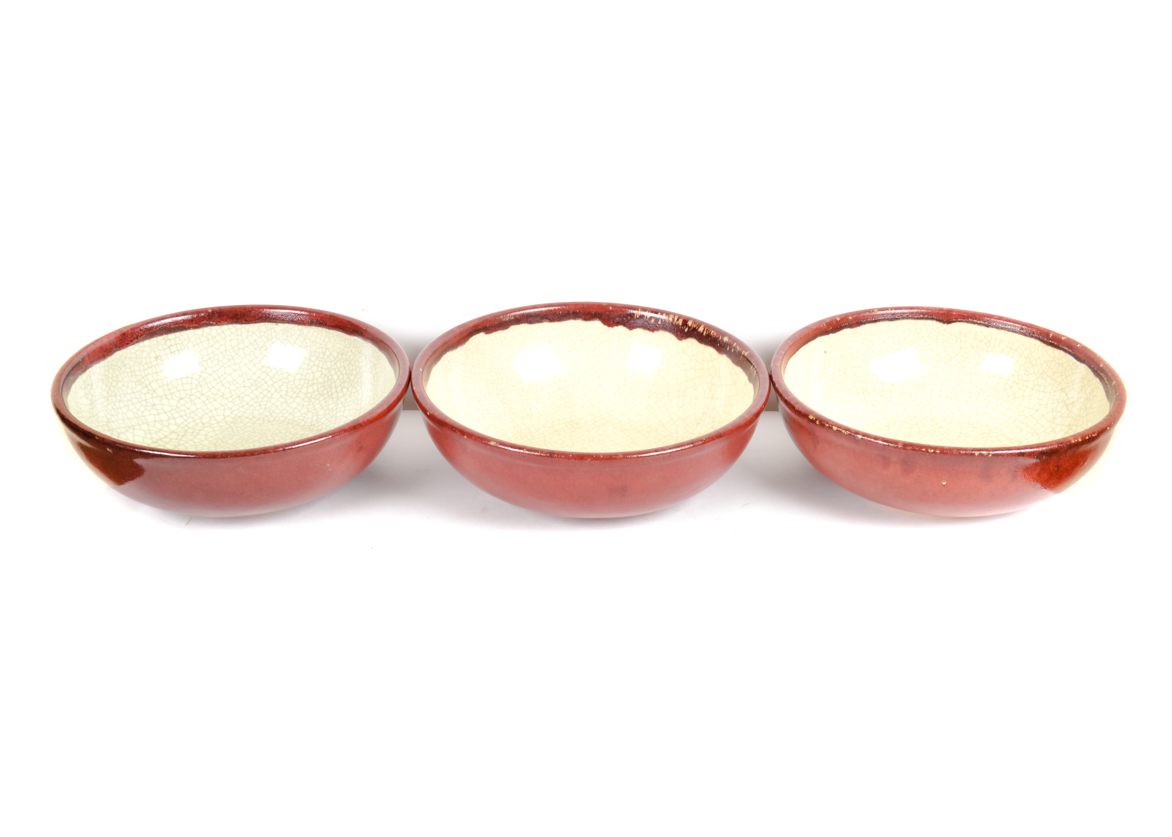 Set of Three Red and Cream Crazed Bowls