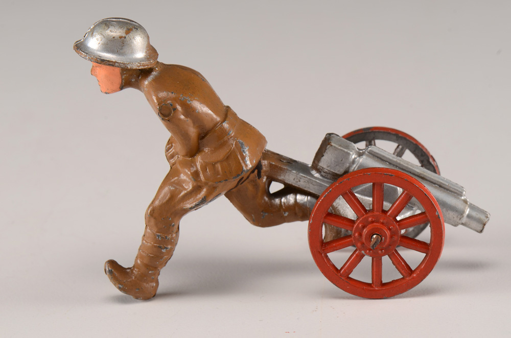 Vintage Manoil Lead Toy Figurine "Soldier Running with a Cannon"