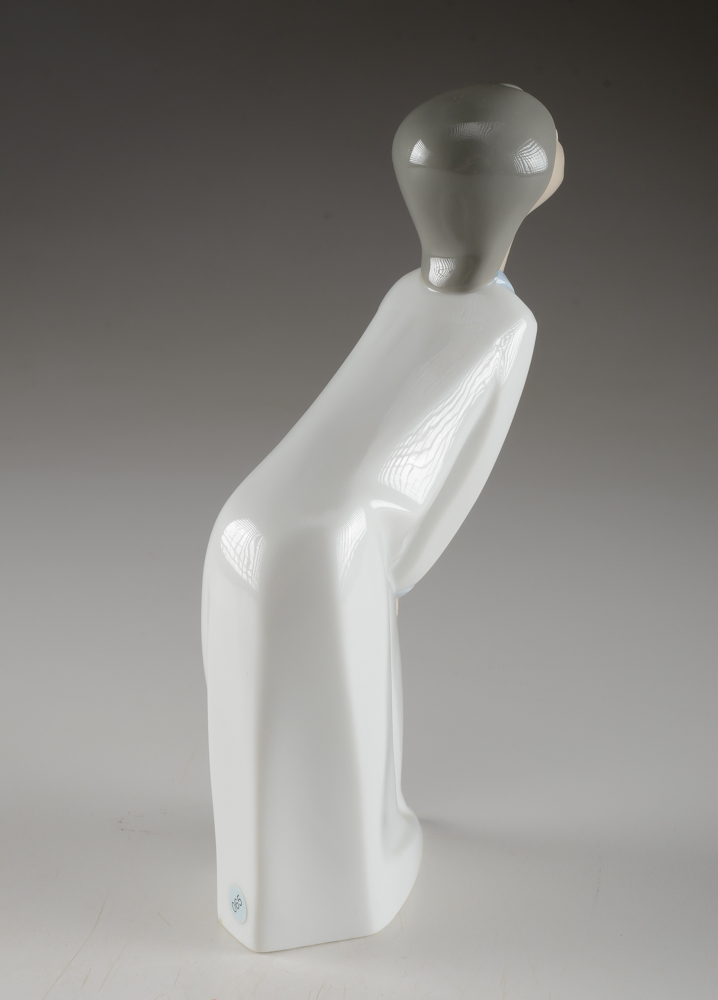 Lladro "Girl Kissing" Figurine