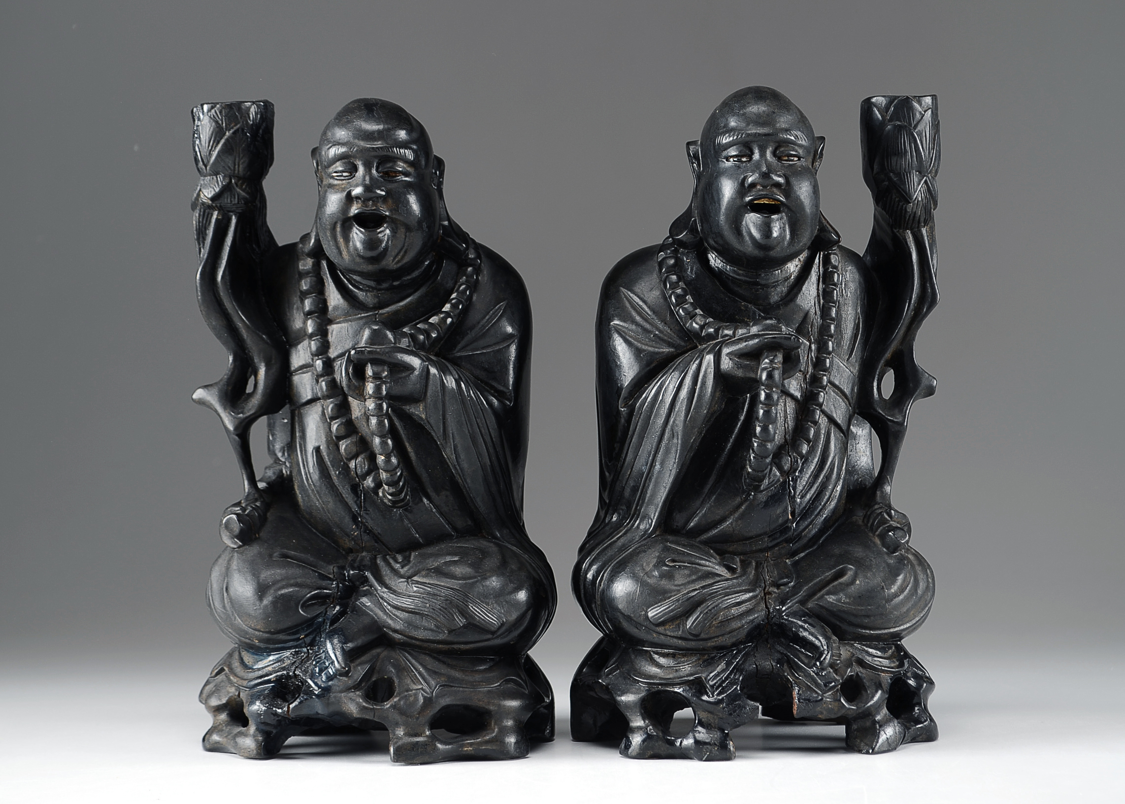Two Asian Lacquered Wooden Buddha Candle Holders