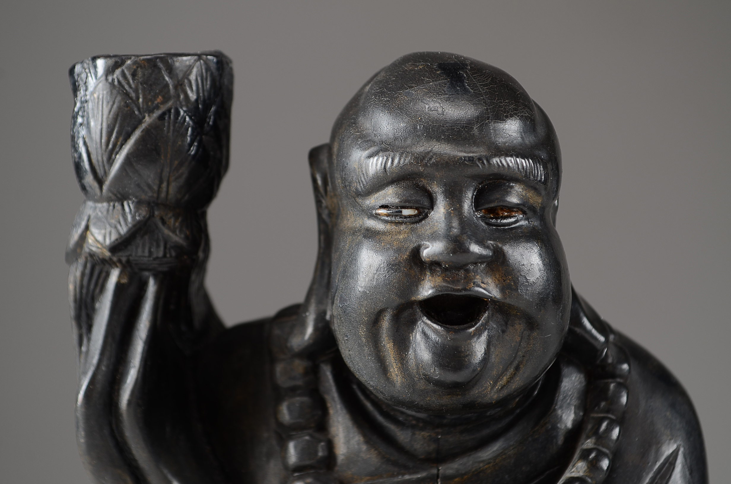 Two Asian Lacquered Wooden Buddha Candle Holders