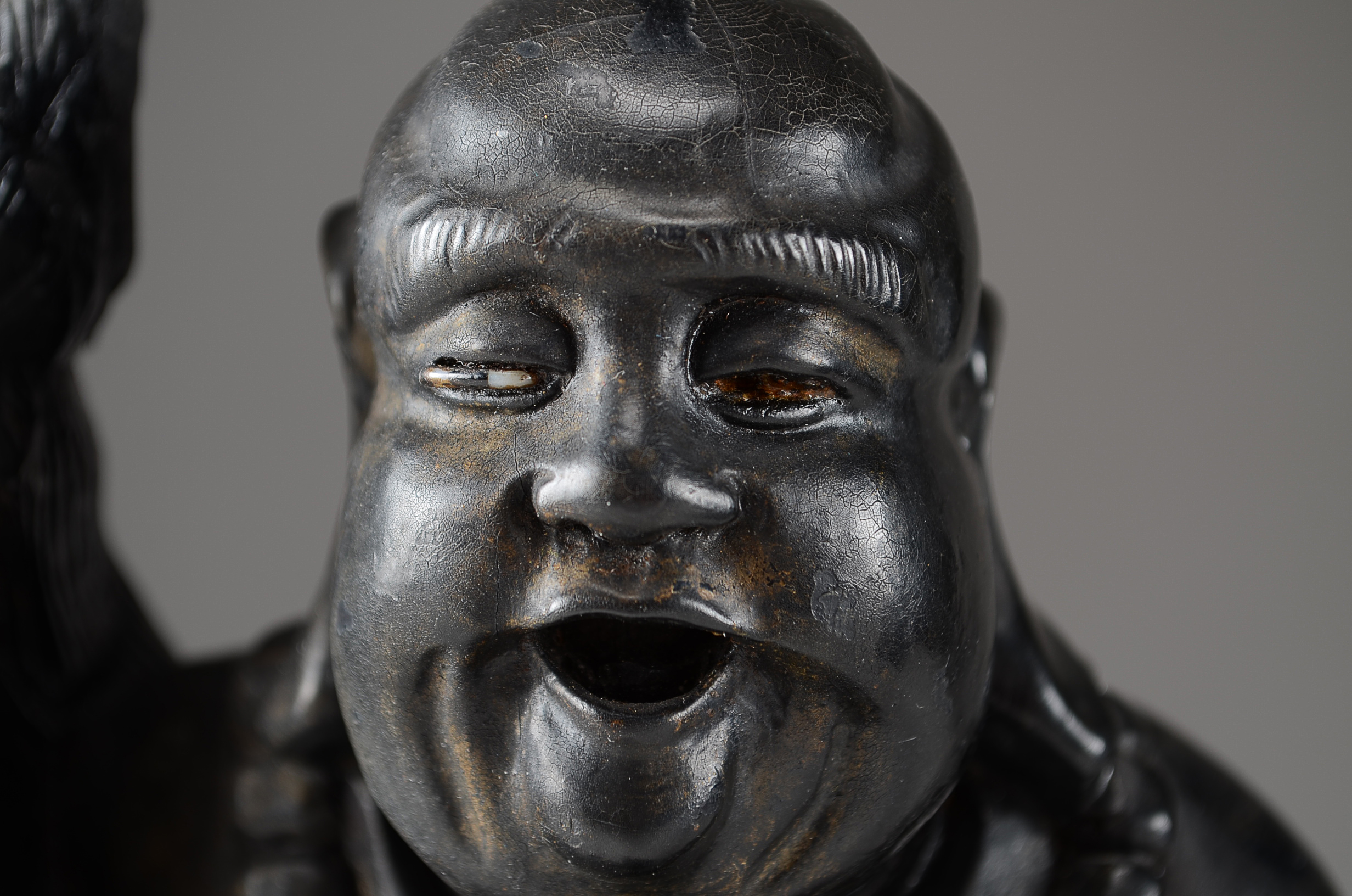 Two Asian Lacquered Wooden Buddha Candle Holders