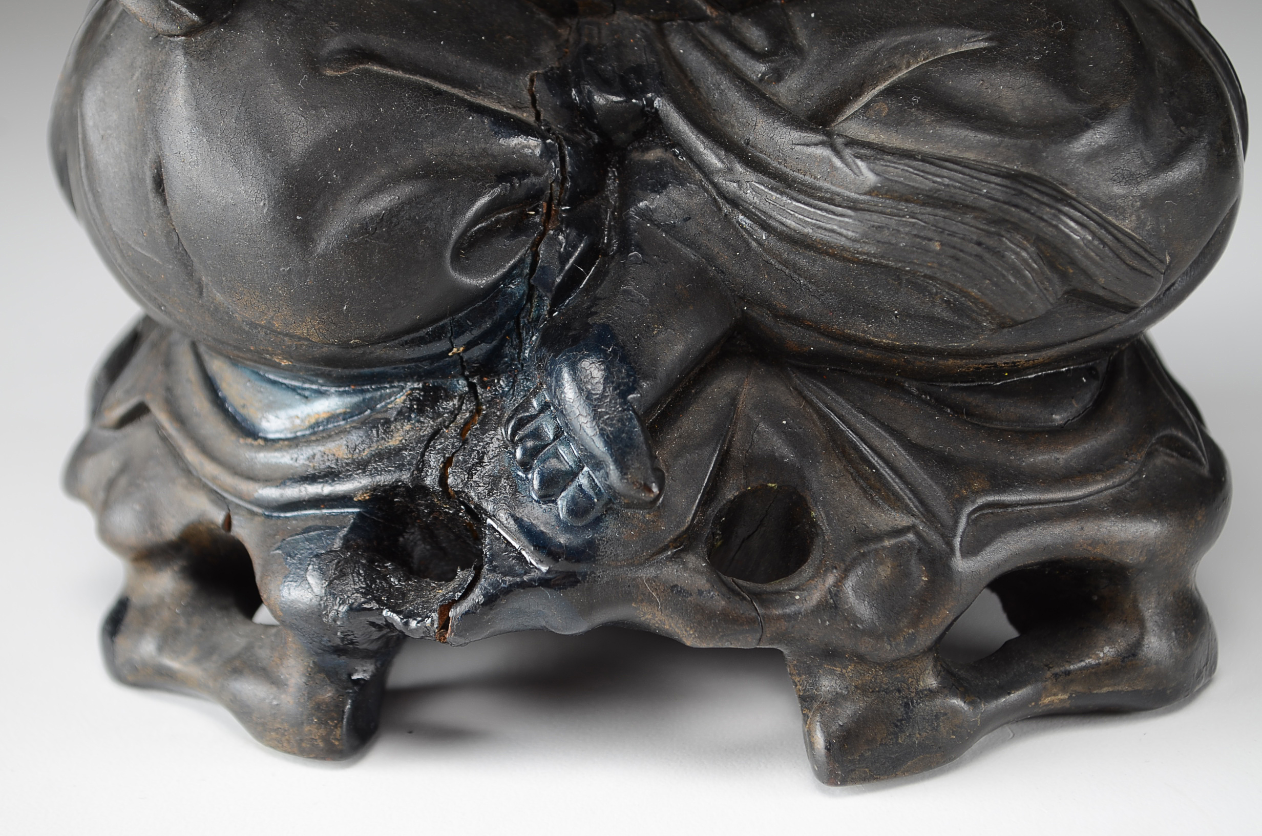 Two Asian Lacquered Wooden Buddha Candle Holders