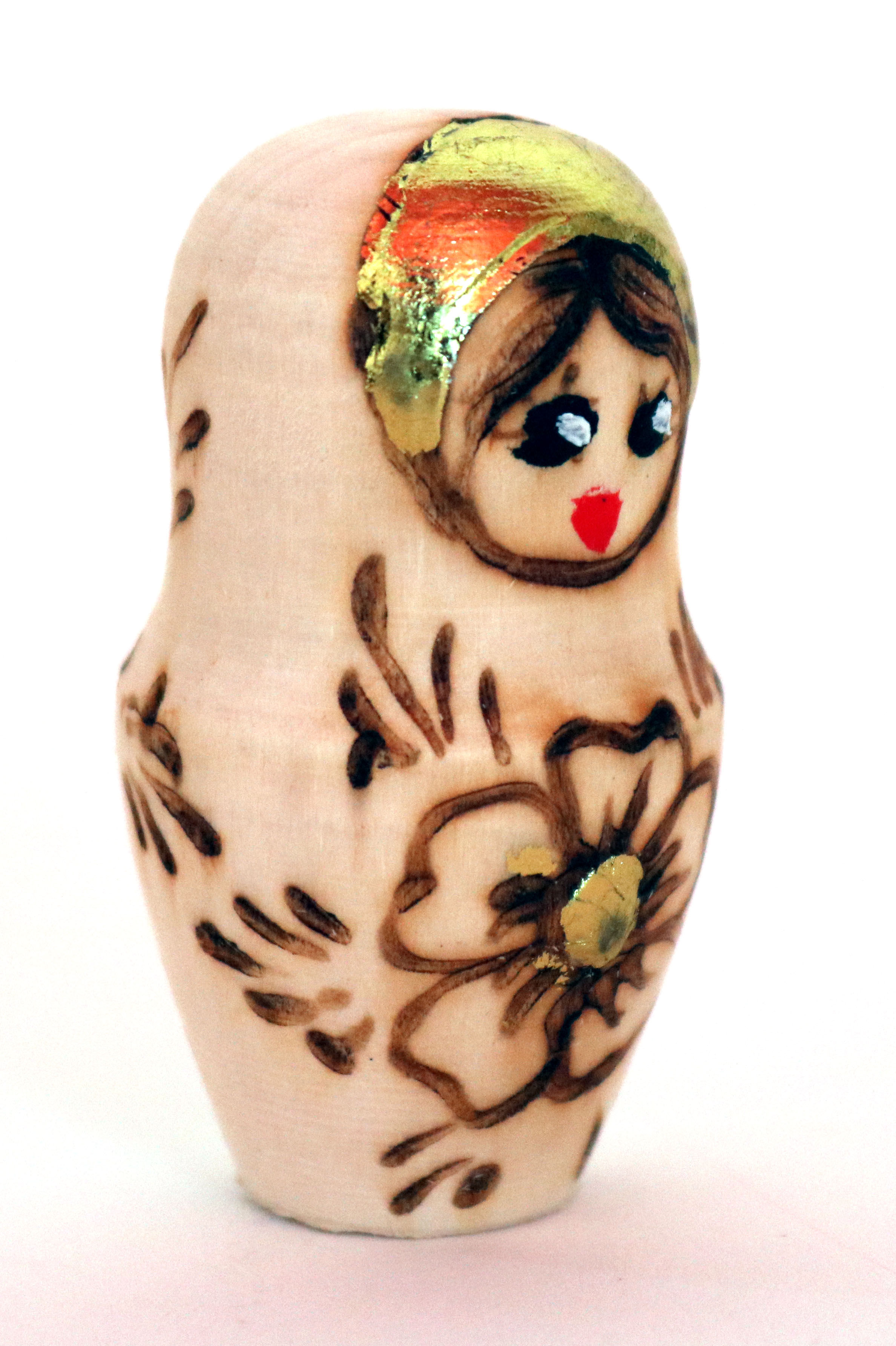 Pyrographed Five-Piece Gilt Matryoshka Doll Set