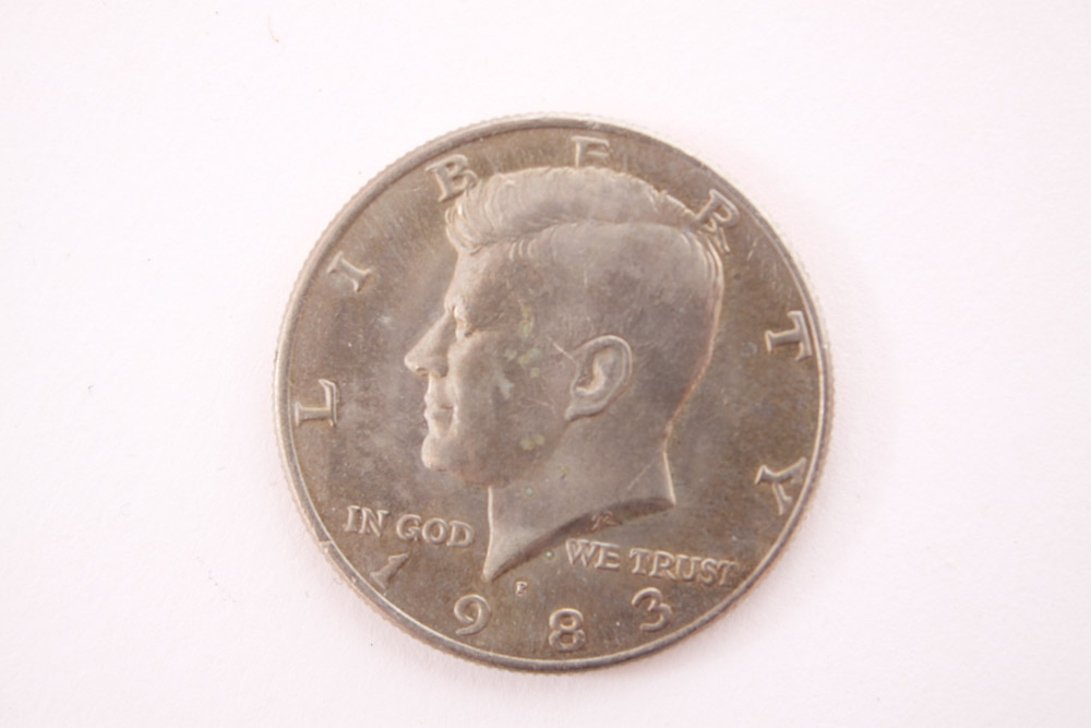 Eisenhower Dollar and Kennedy Half Dollar Coins