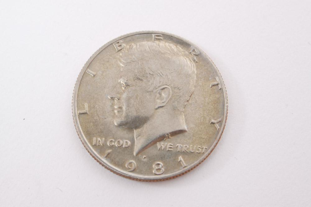 Eisenhower Dollar and Kennedy Half Dollar Coins