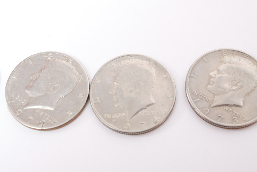 Eisenhower Dollar and Kennedy Half Dollar Coins