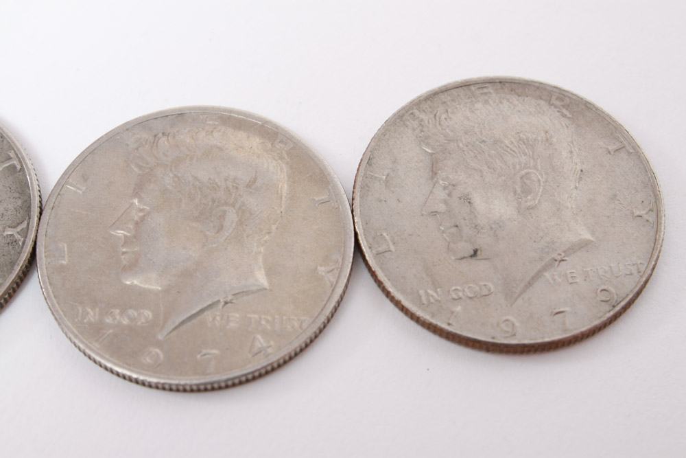 Eisenhower Dollar and Kennedy Half Dollar Coins