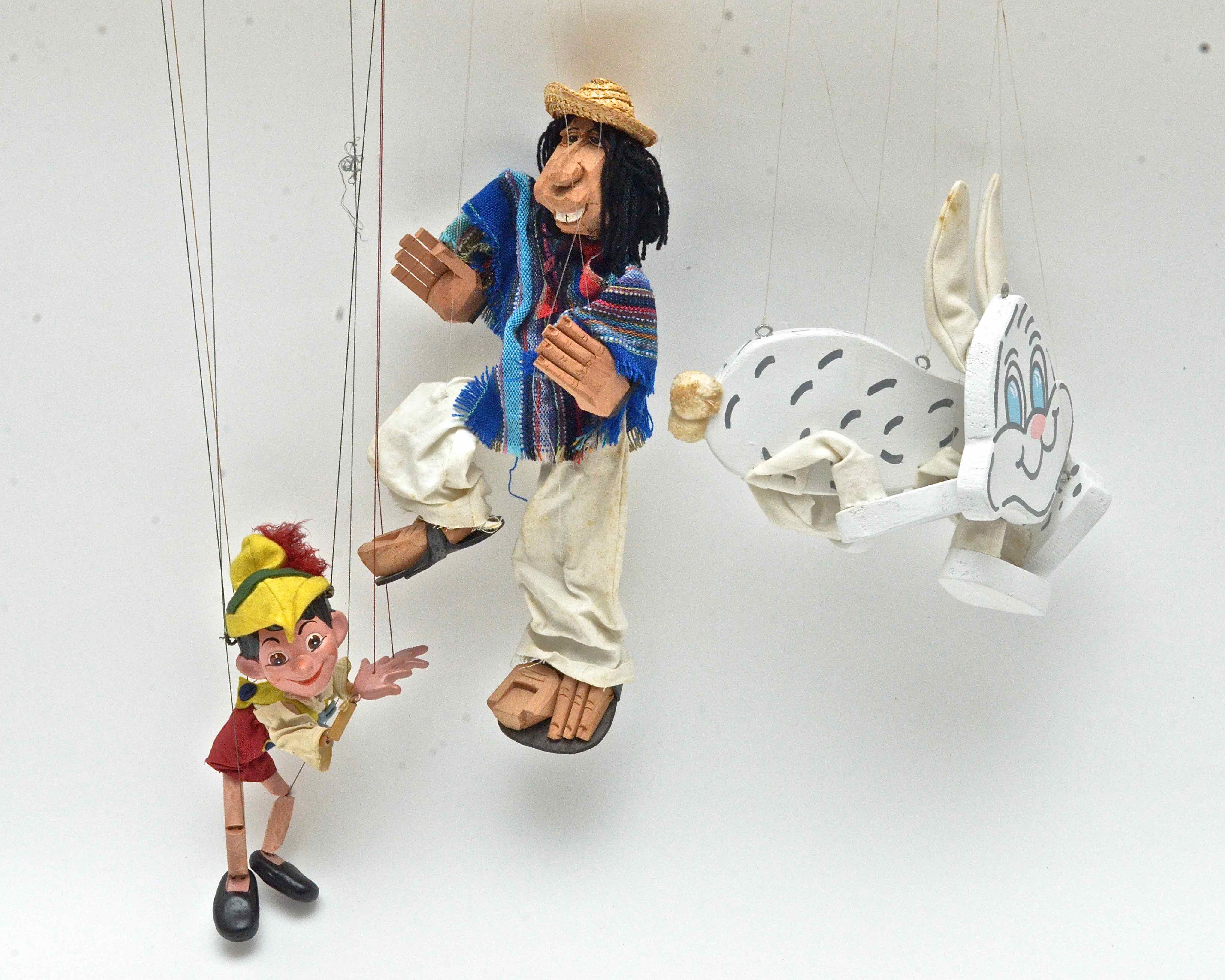 Three Marrionettes including Vintage Pinnochio