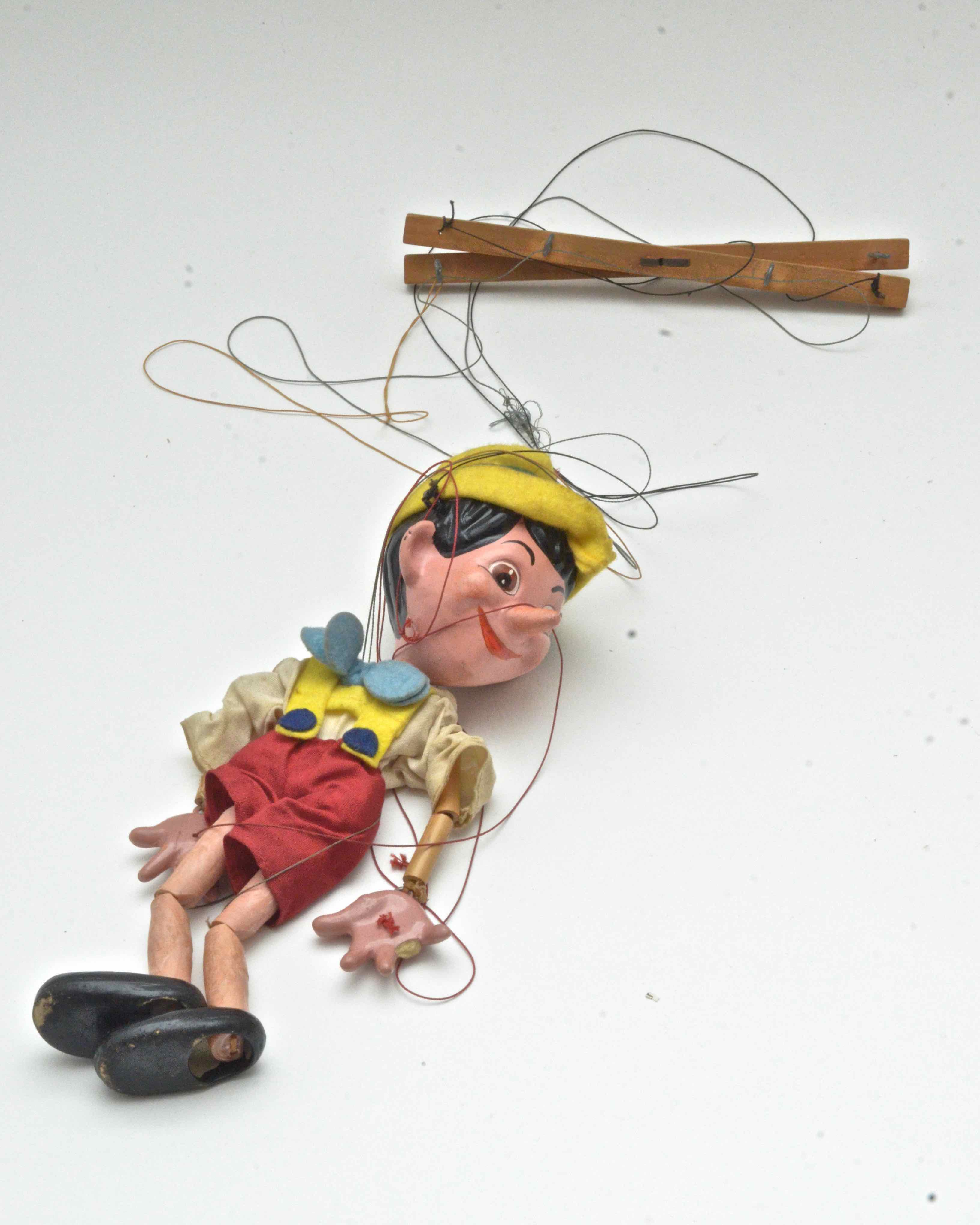 Three Marrionettes including Vintage Pinnochio