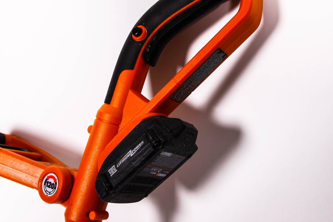 Chainsaw and Pair of Lawn Trimmers