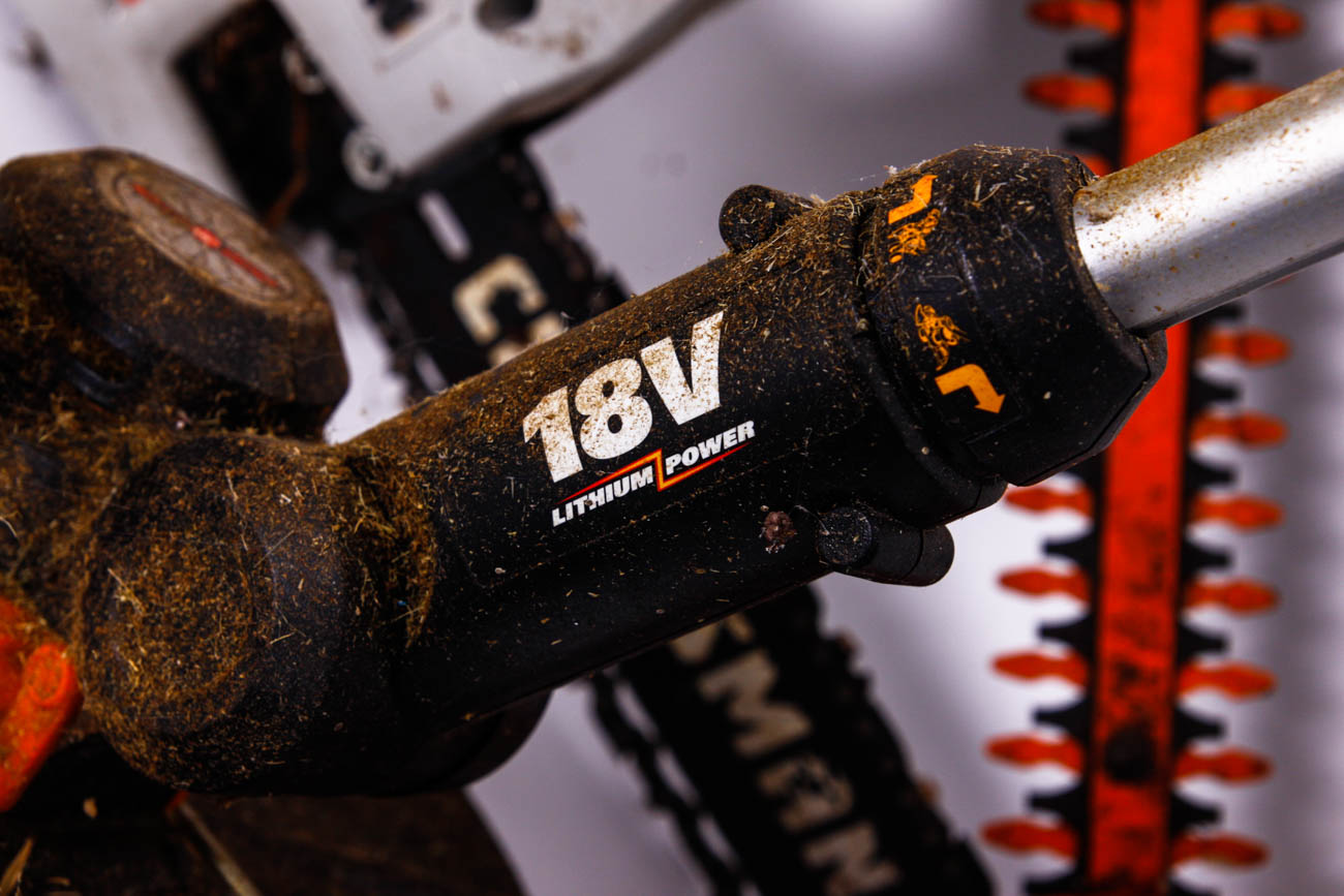 Chainsaw and Pair of Lawn Trimmers