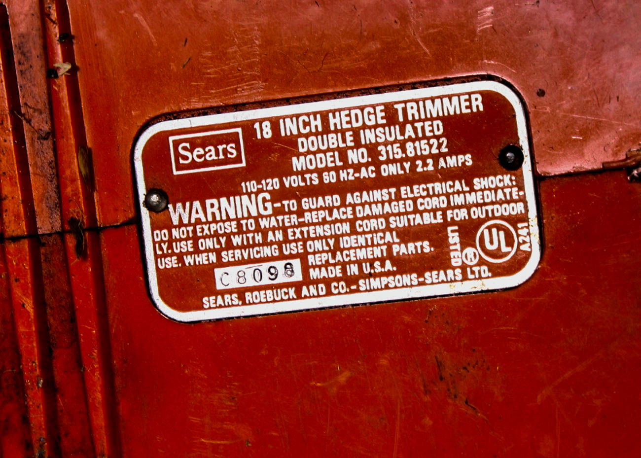 Chainsaw and Pair of Lawn Trimmers