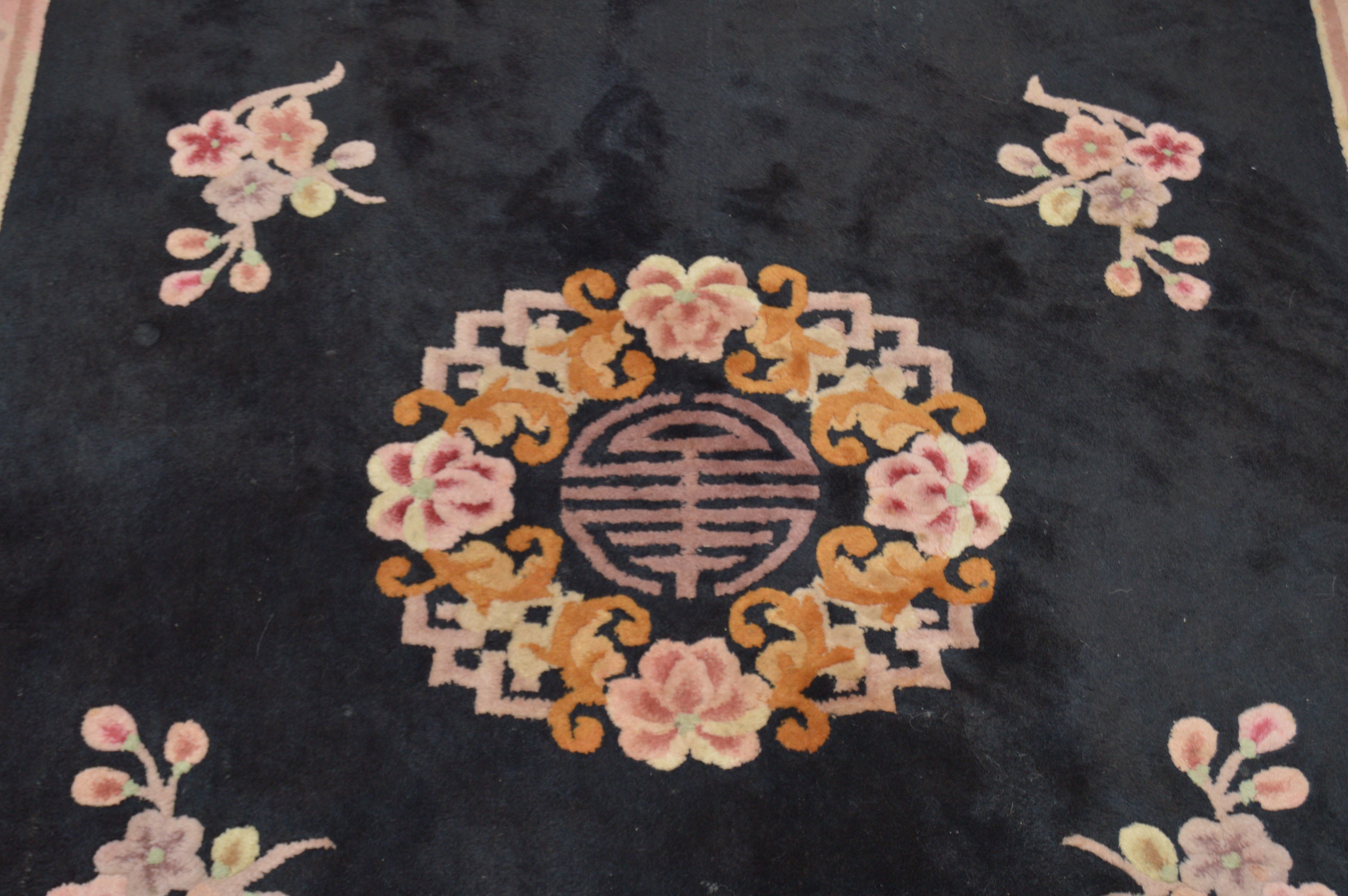 Black Area Rug with East Asian Floral Motif