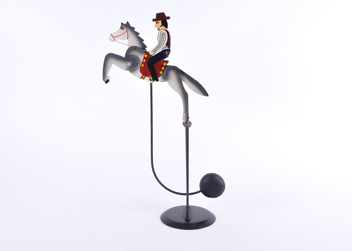 Metal Balancing Sculpture of a Cowboy