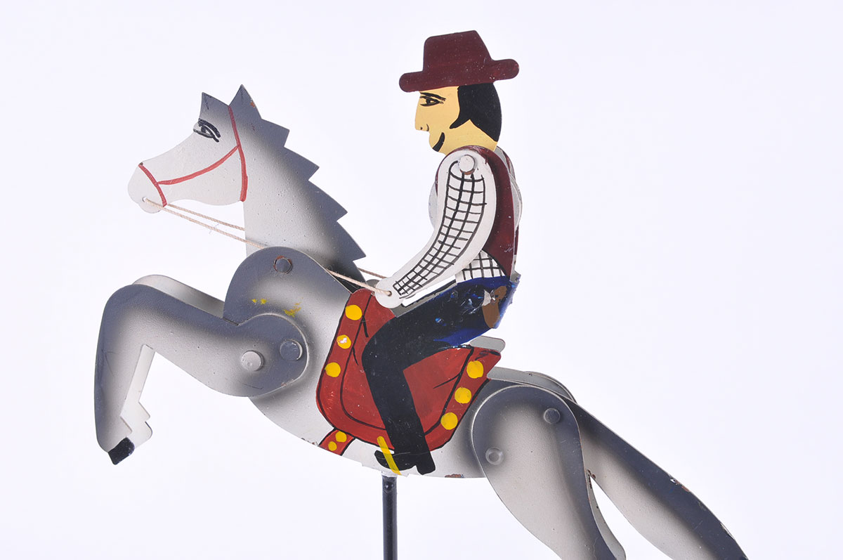 Metal Balancing Sculpture of a Cowboy