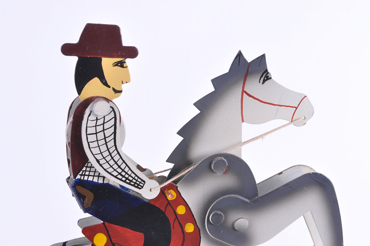 Metal Balancing Sculpture of a Cowboy