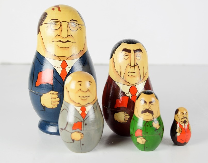 Nine Russian Nesting Dolls Representing Leaders