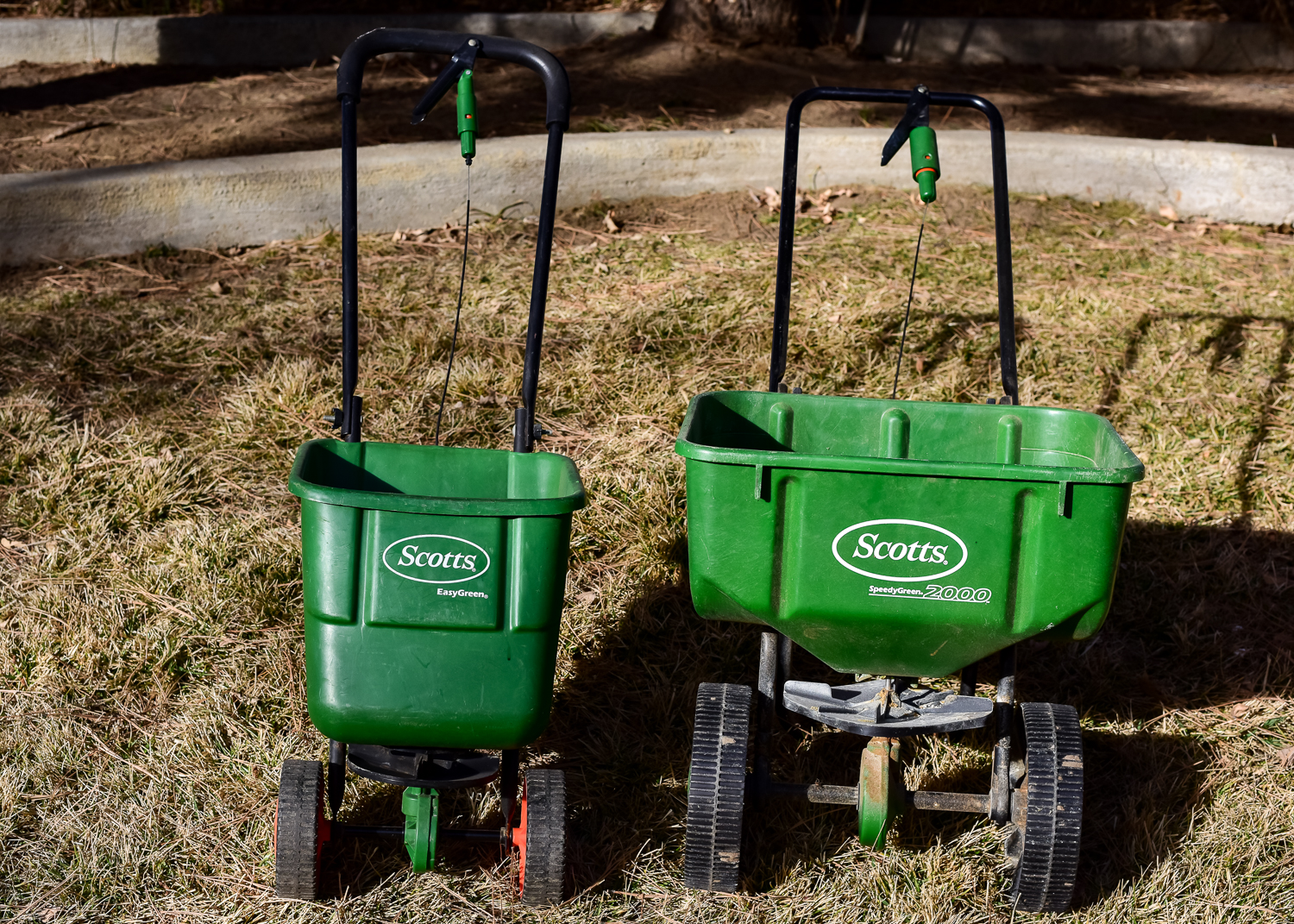 Pair Of Scotts Spreaders