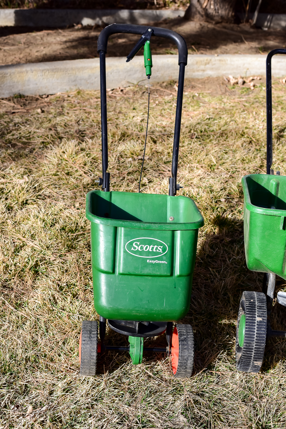 Pair Of Scotts Spreaders