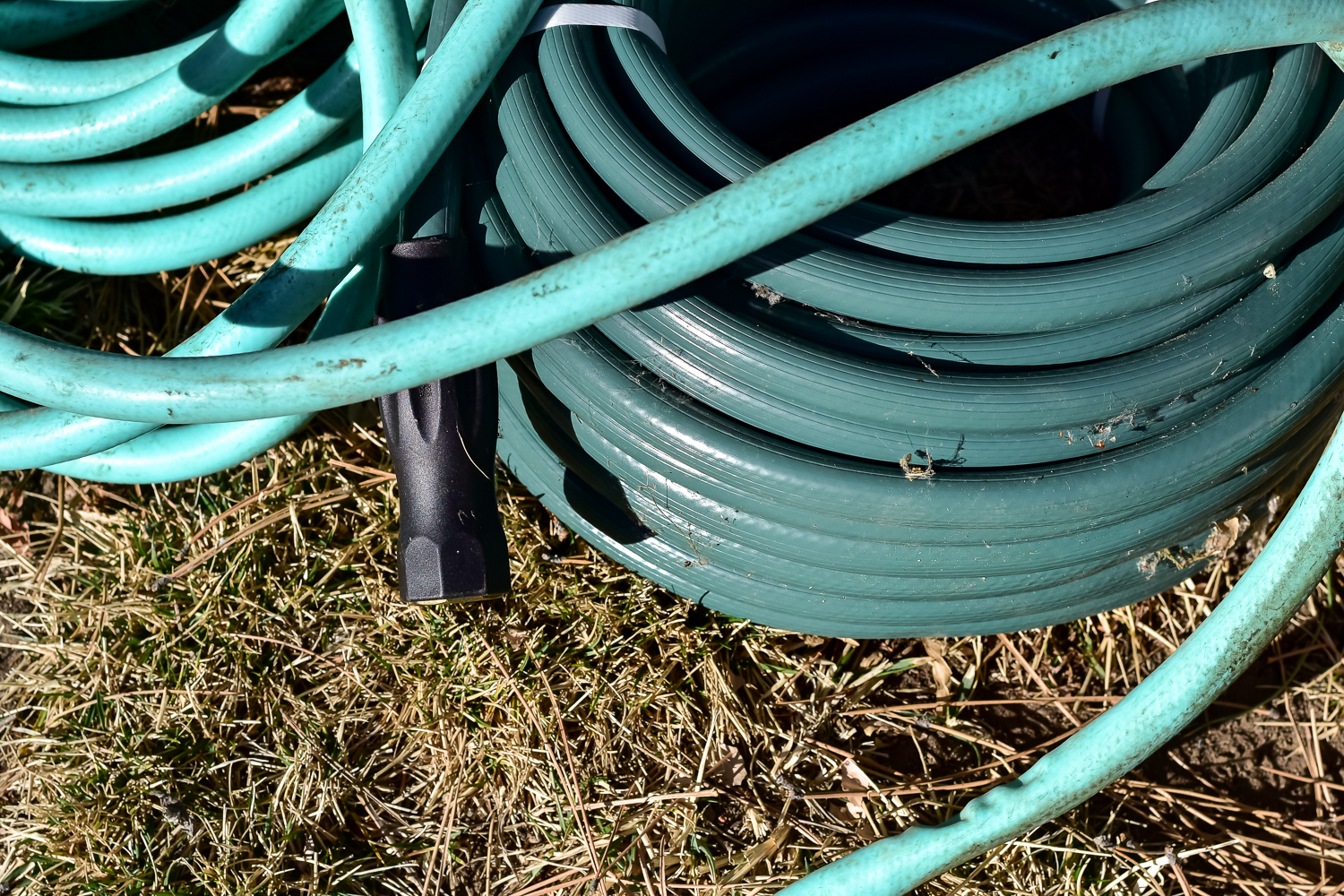 Pair of Green Vinyl Garden Hoses