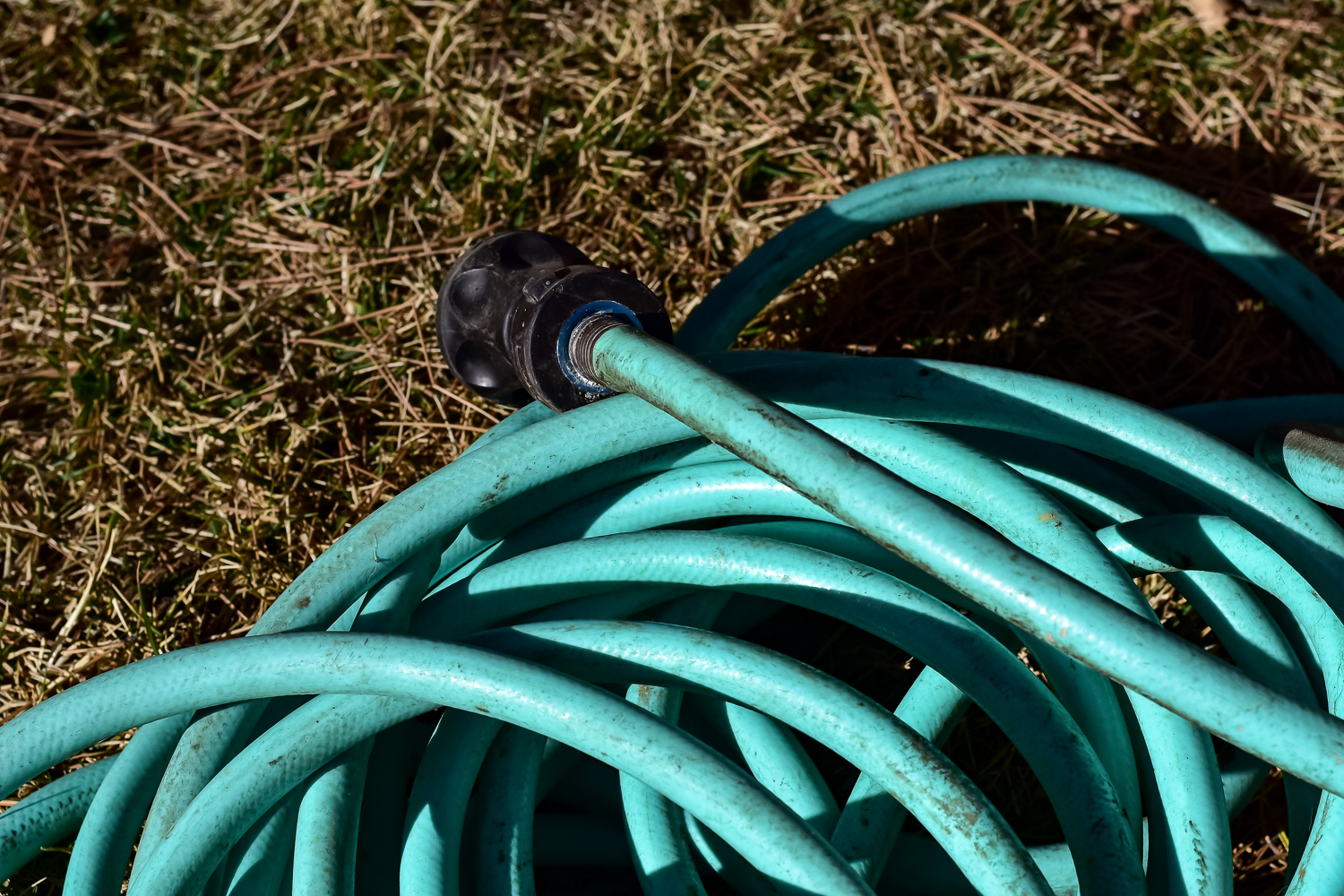 Pair of Green Vinyl Garden Hoses