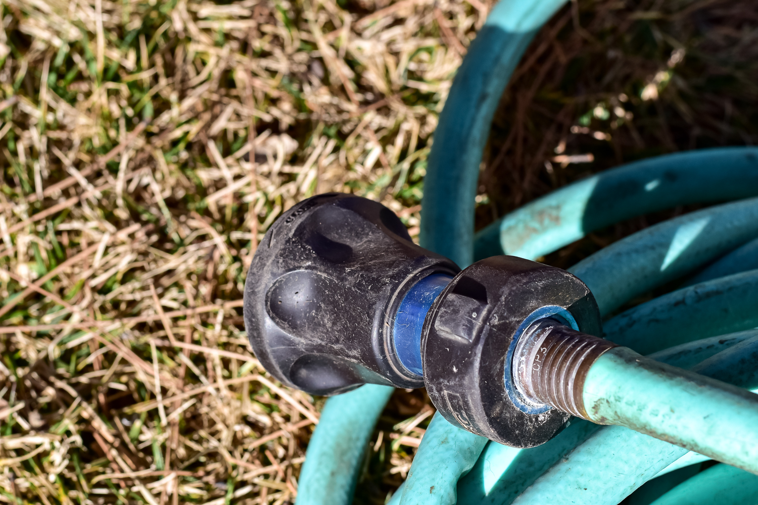 Pair of Green Vinyl Garden Hoses