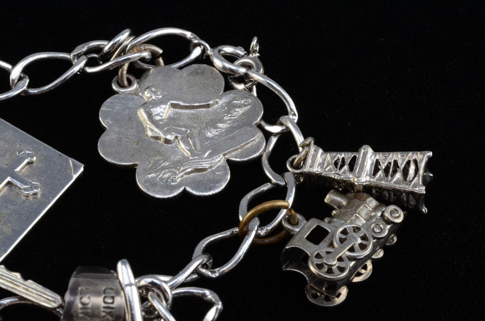 Group of Sterling Jewelry Including Charm Bracelet