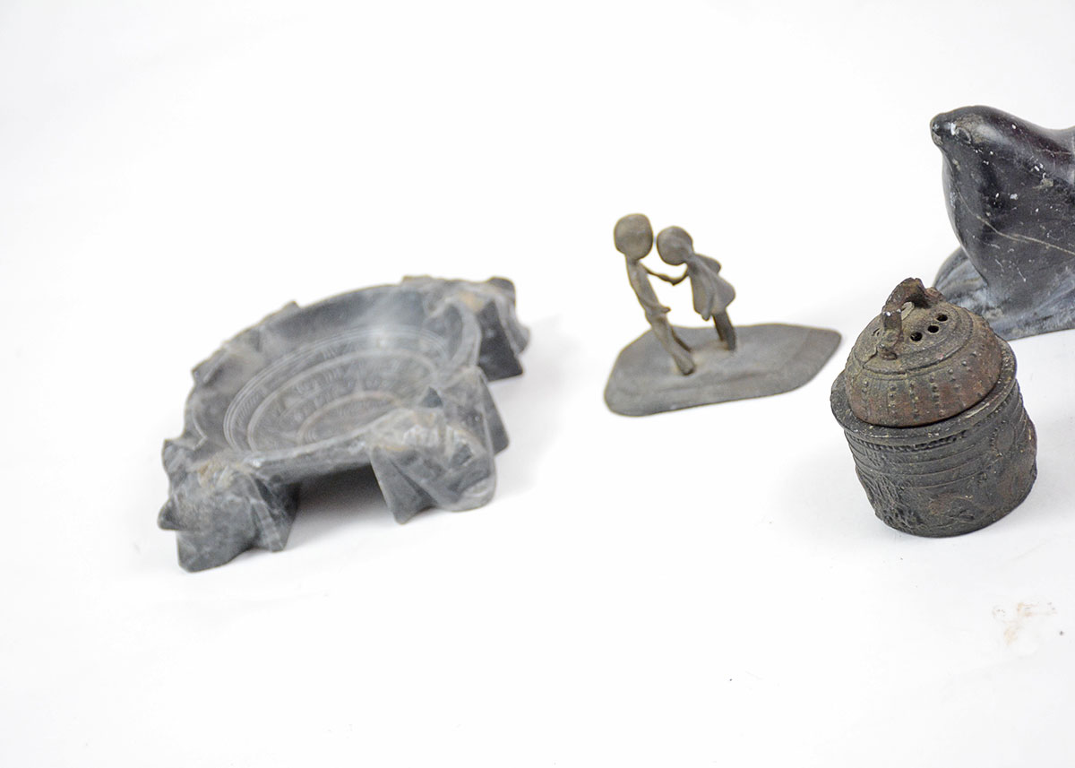 Collection of Decorative Bowls and Figurines