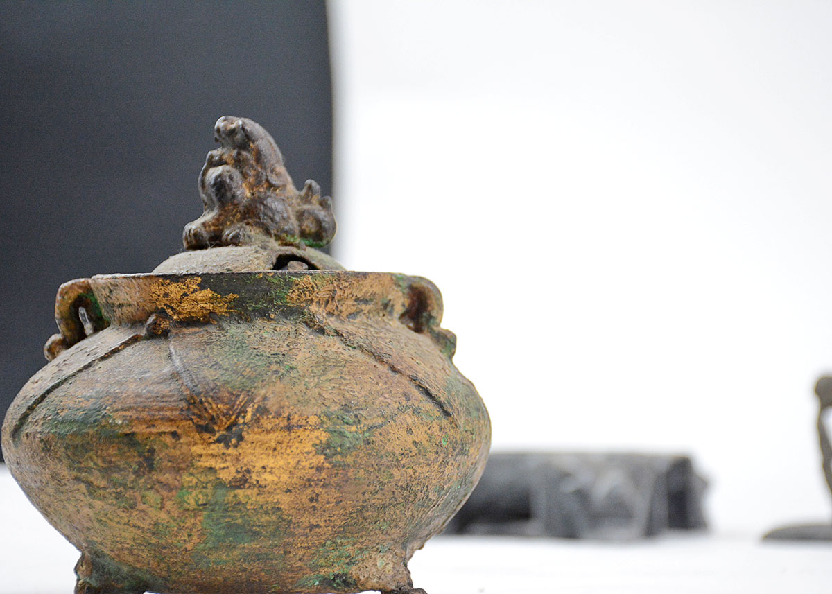 Collection of Decorative Bowls and Figurines