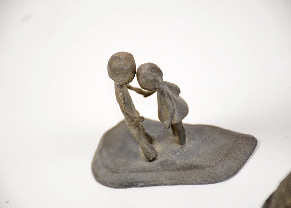 Collection of Decorative Bowls and Figurines