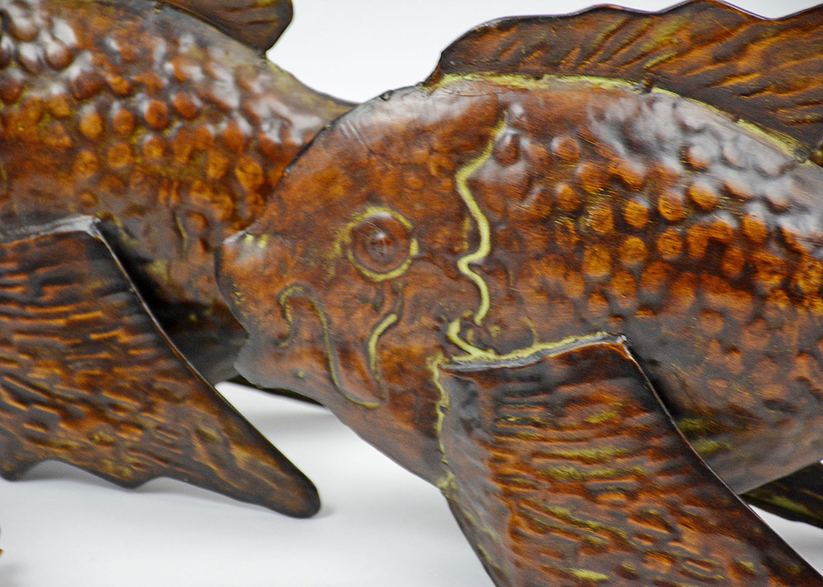 Decorative Pair of Antiqued Hammered Tin Fish and Carved Wooden Fish