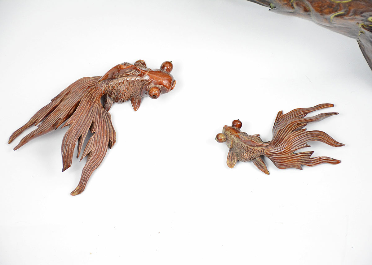 Decorative Pair of Antiqued Hammered Tin Fish and Carved Wooden Fish