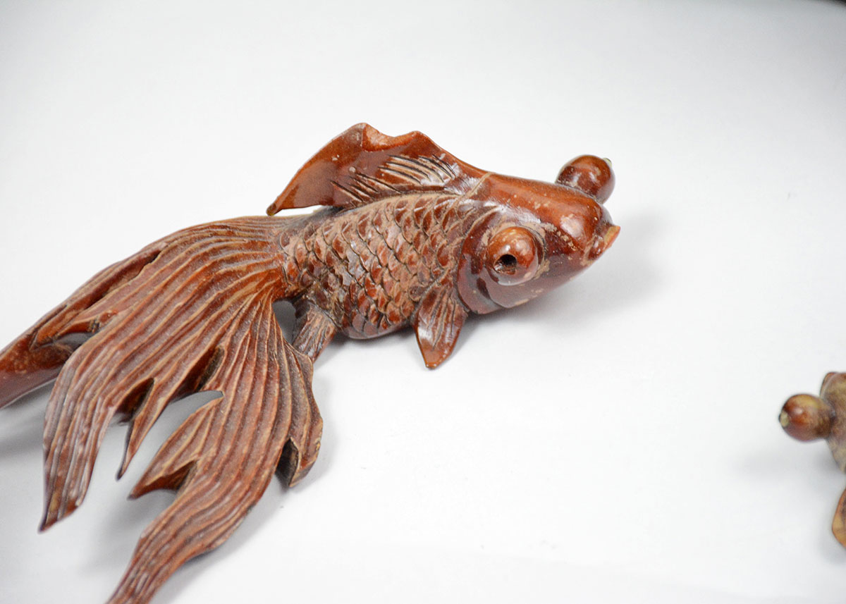 Decorative Pair of Antiqued Hammered Tin Fish and Carved Wooden Fish