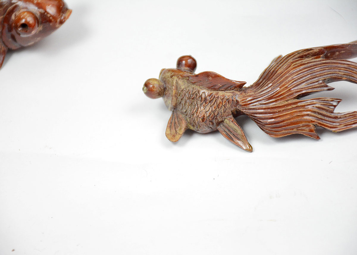 Decorative Pair of Antiqued Hammered Tin Fish and Carved Wooden Fish