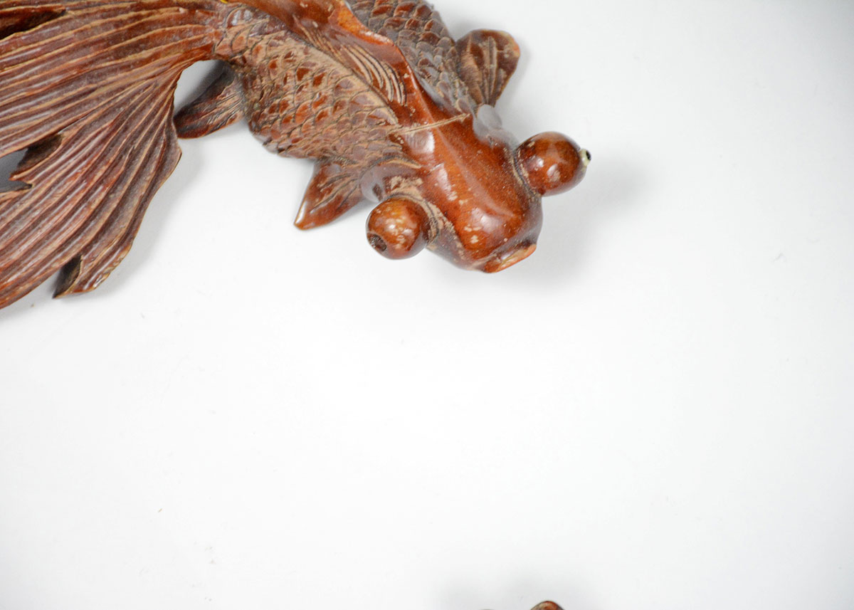 Decorative Pair of Antiqued Hammered Tin Fish and Carved Wooden Fish