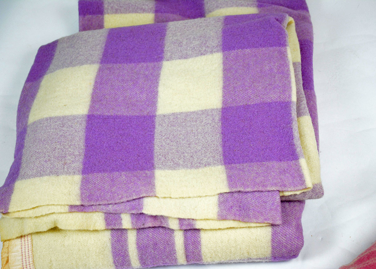 Set of Four Pink and Purple Plaid Wool Blankets