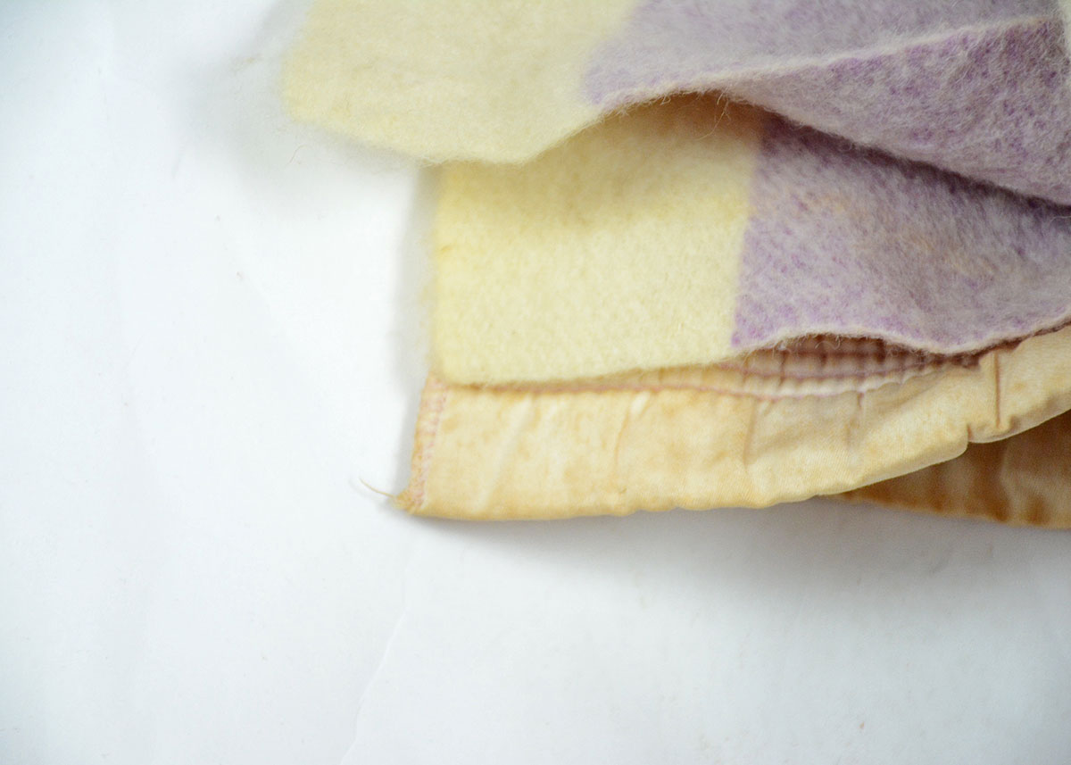 Set of Four Pink and Purple Plaid Wool Blankets