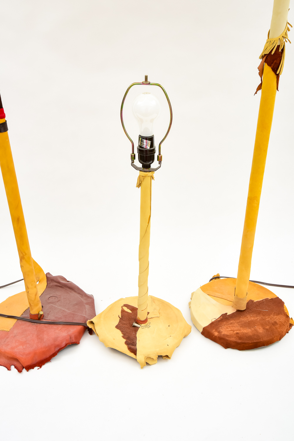 Grouping of Cowhide Lamps Including Nan Sheridan