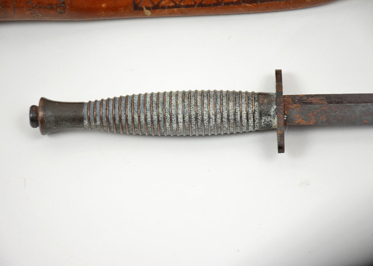 Two Knives and a Carved Flute