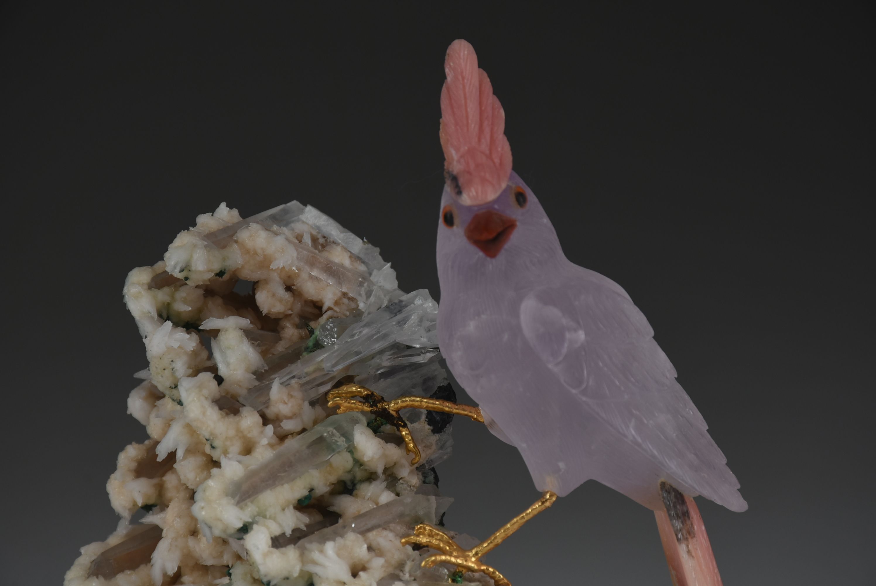 Carved Stone Bird Sculpture on Mineral Base