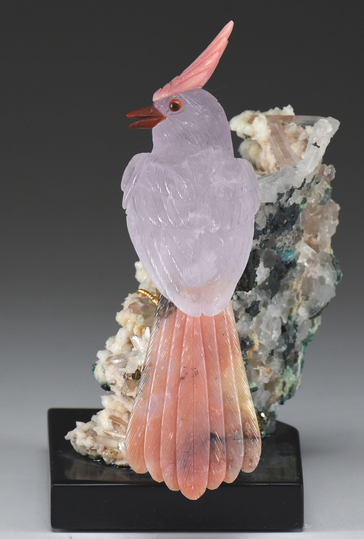 Carved Stone Bird Sculpture on Mineral Base