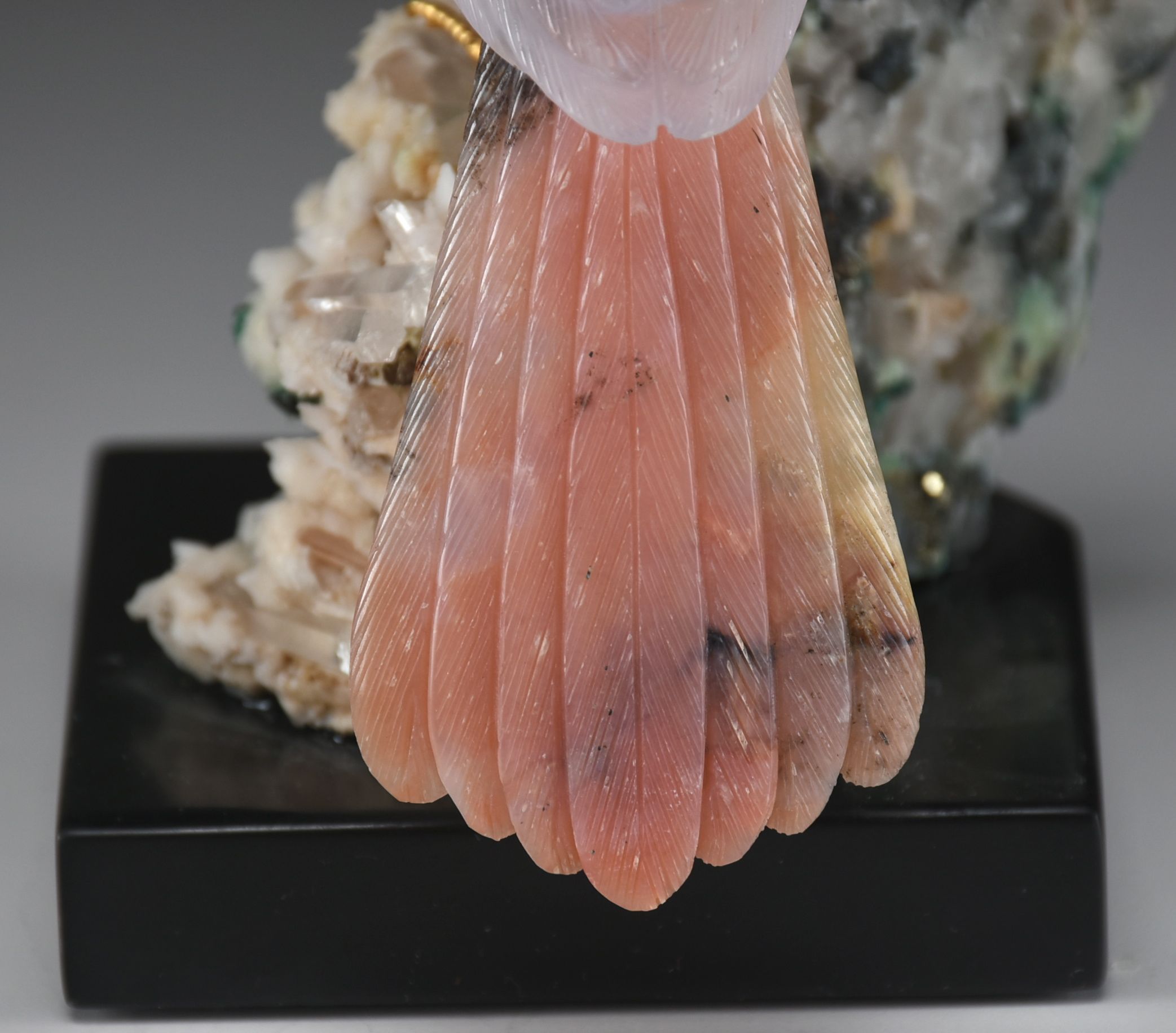 Carved Stone Bird Sculpture on Mineral Base