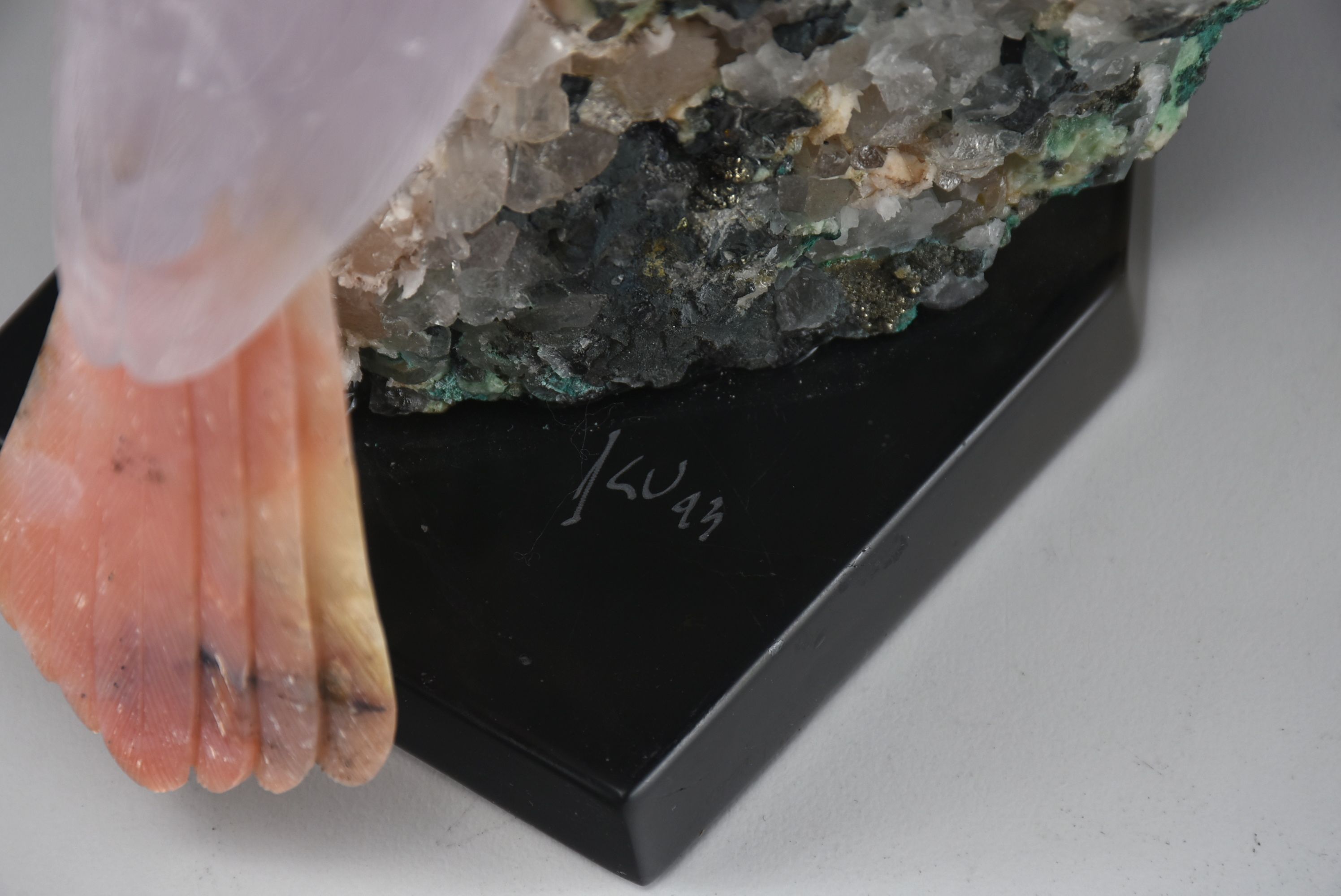 Carved Stone Bird Sculpture on Mineral Base